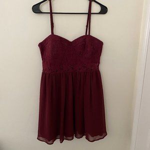 Maroon dress with lace cutouts